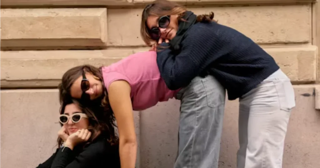 Best friends laughing together during a fun outdoor moment